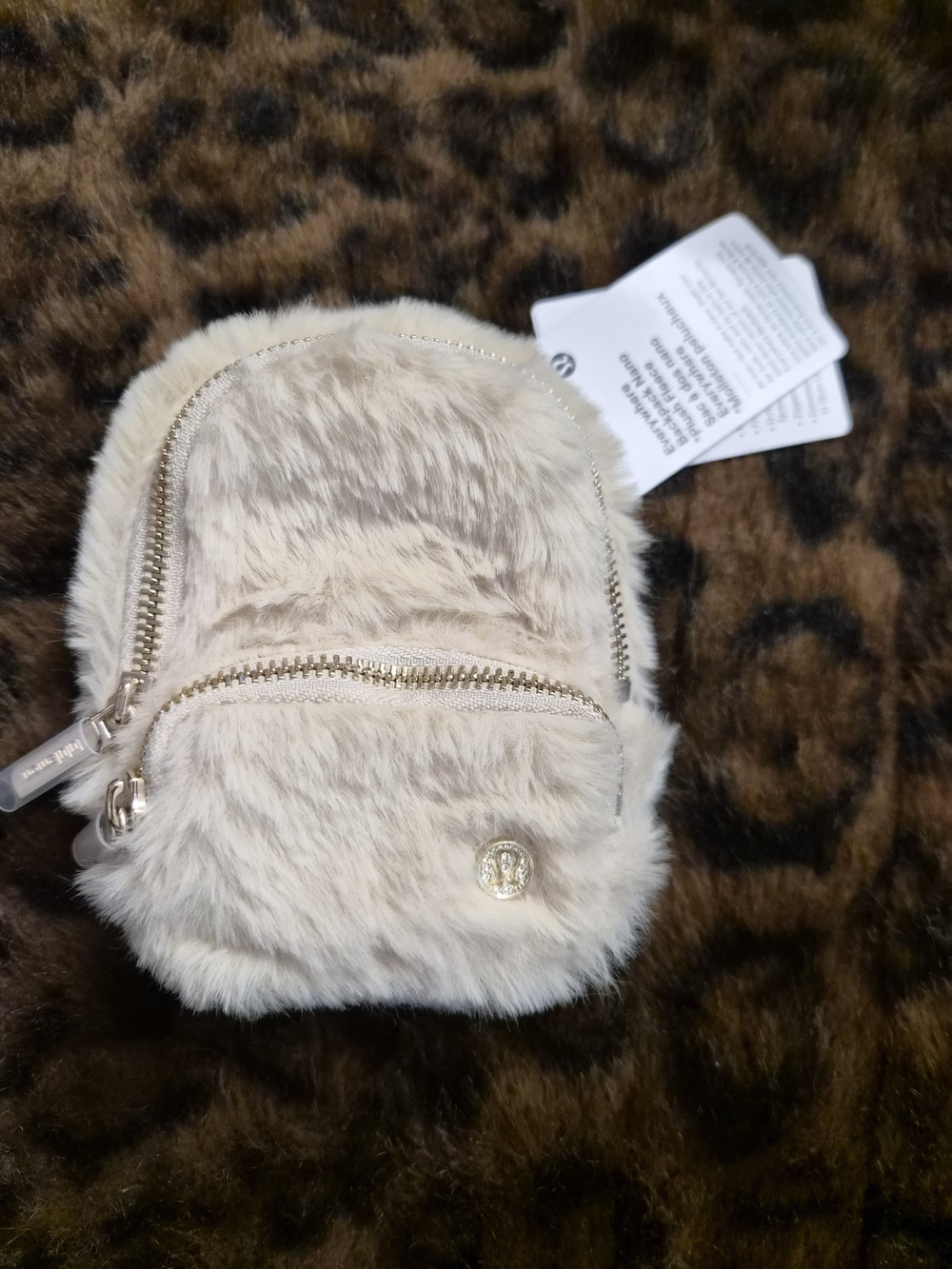 kate spade Cream Faux Fur Mini Backpack Coin Purse with Gold Hardware